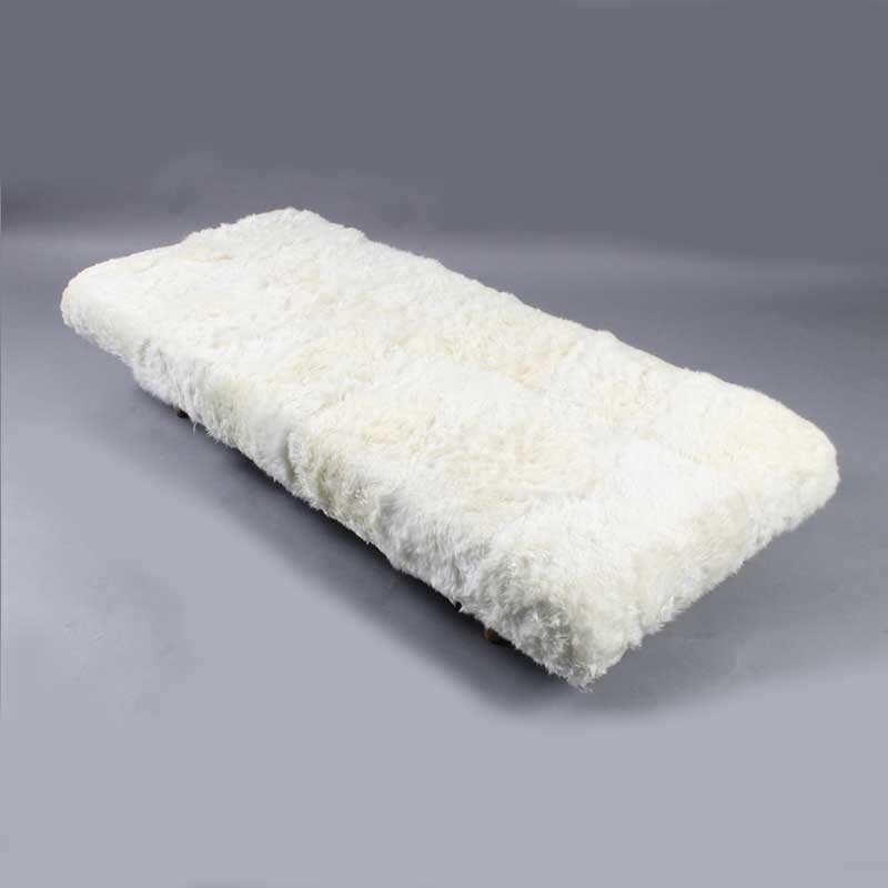 Daybed in white color with wooden legs - Deszine Talks