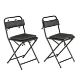 A pair of folding chairs with black leather cushions. - Deszine Talks