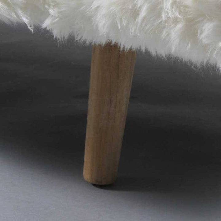 Daybed in white color with wooden legs - Deszine Talks