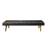 Daybed in black leather with wooden legs - Deszine Talks