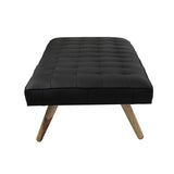 Daybed in buttoned black leather with massive oblique legs - Deszine Talks