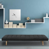 Daybed in buttoned black leather with massive oblique legs - Deszine Talks